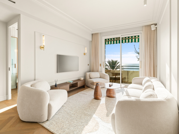 Modern living room with sea view, contemporary furniture and large windows in Nice