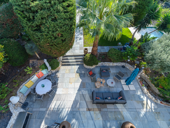Aerial view of a garden with swimming pool and outdoor furniture, Marseille.