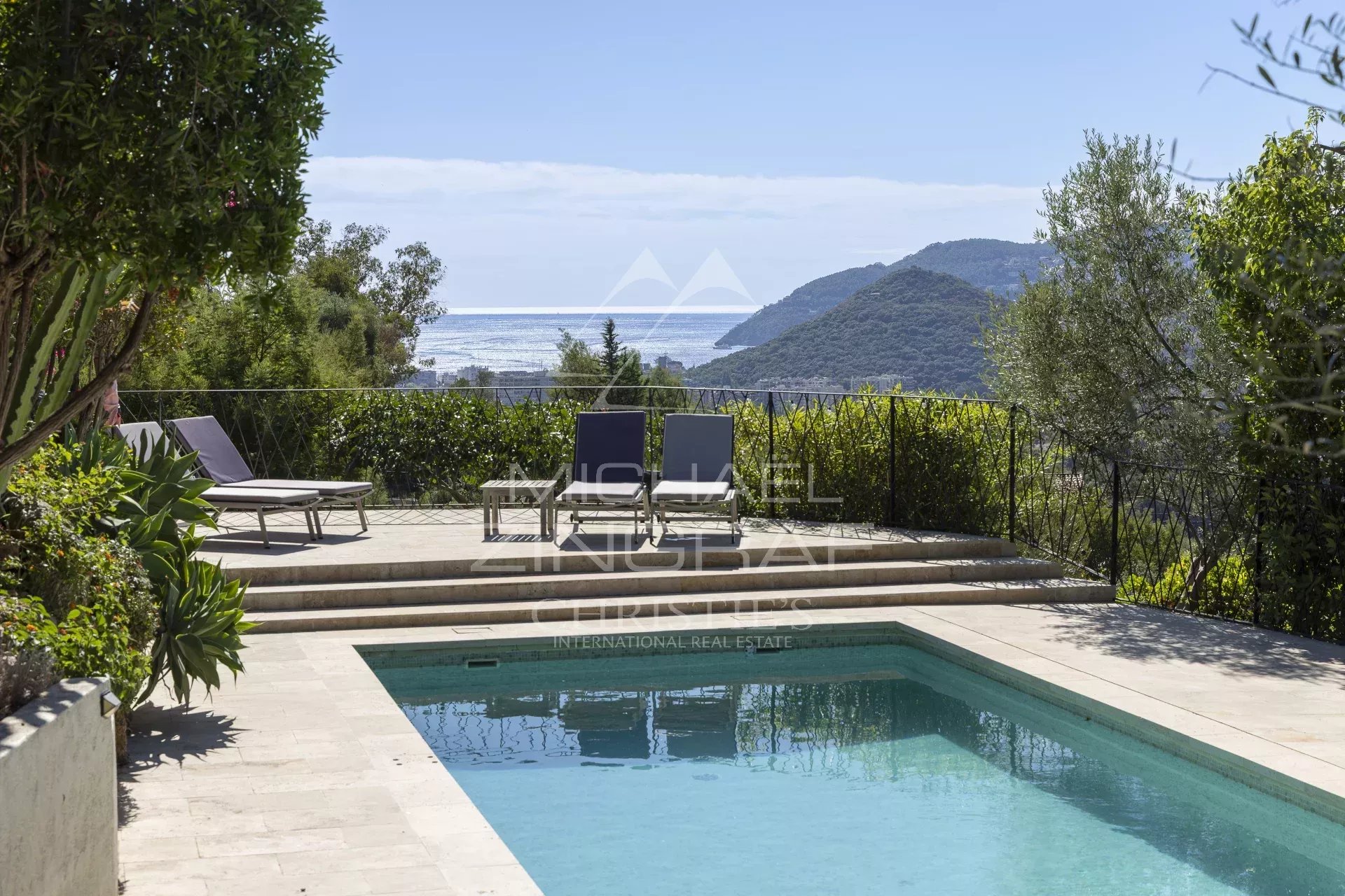 View from the pool and sun loungers with panoramic sea views in Mandelieu-la-Napoule.