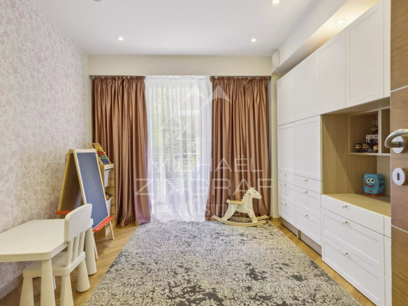 Bedroom in a contemporary apartment in Théoule-sur-Mer, with modern furniture and light decor.