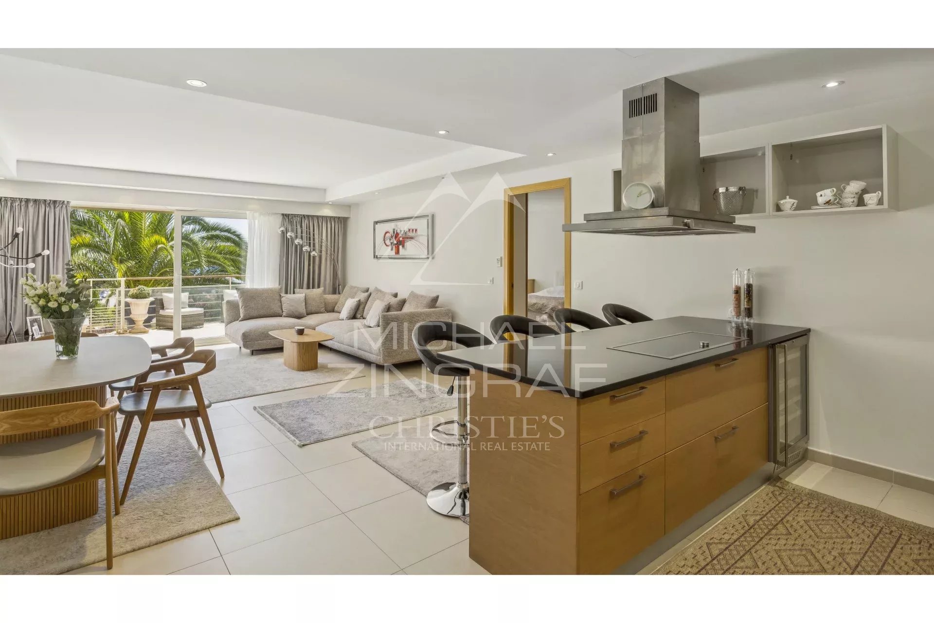 Contemporary apartment in Théoule-sur-Mer Interior of a contemporary apartment with open kitchen and bright living room in Théoule-sur-Mer.