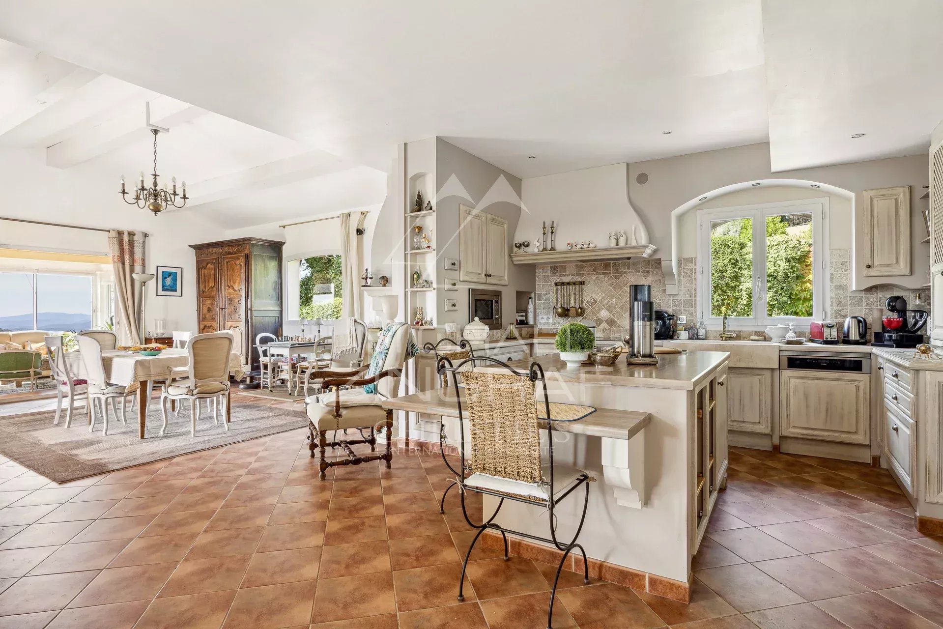 Elegant interior of a Provençal villa Interior of a Provençal villa with open kitchen and bright living room.
