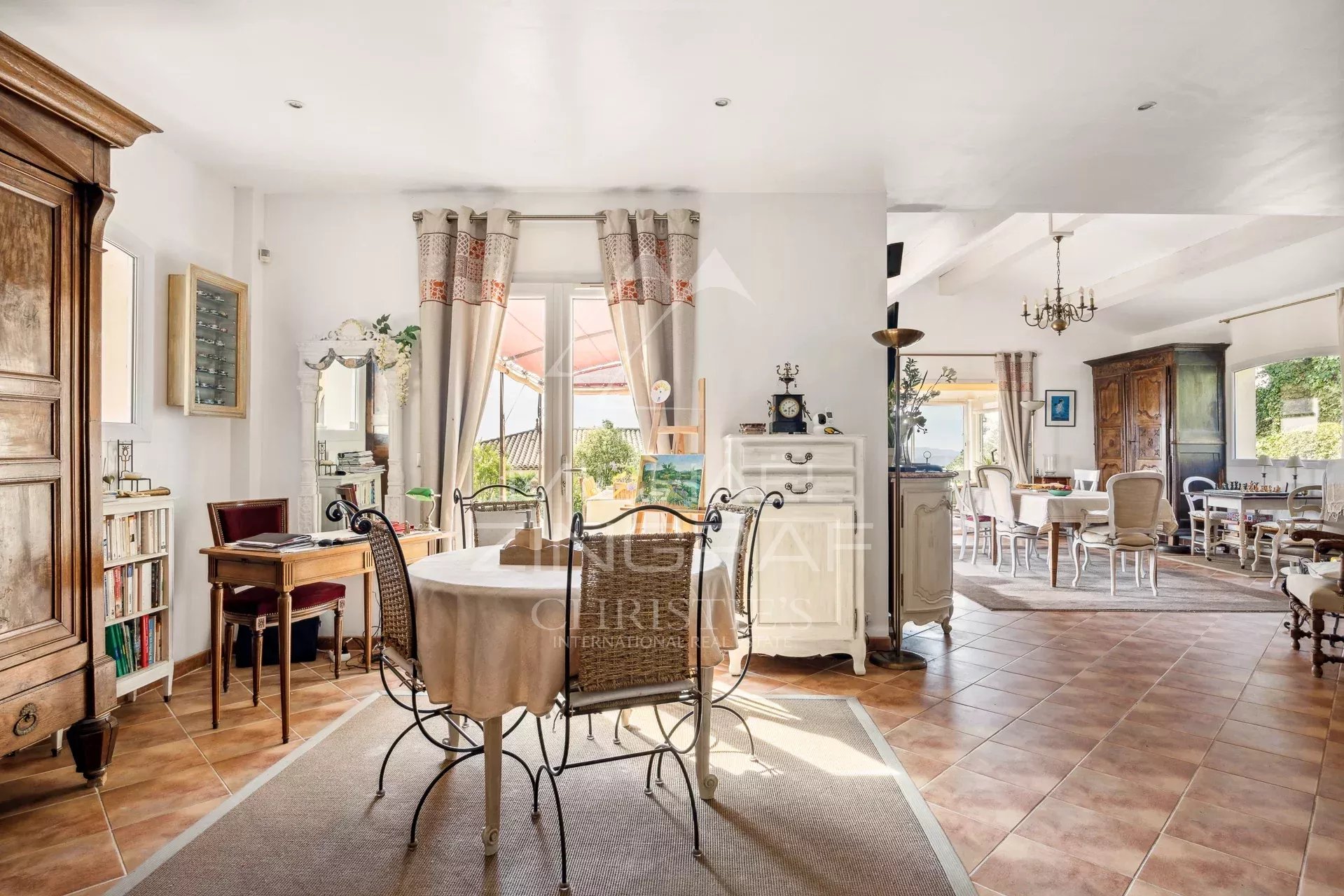 Interior of a Provençal villa Interior of a Provençal villa in Mandelieu-la-Napoule, with living room, dining room and bright kitchen.