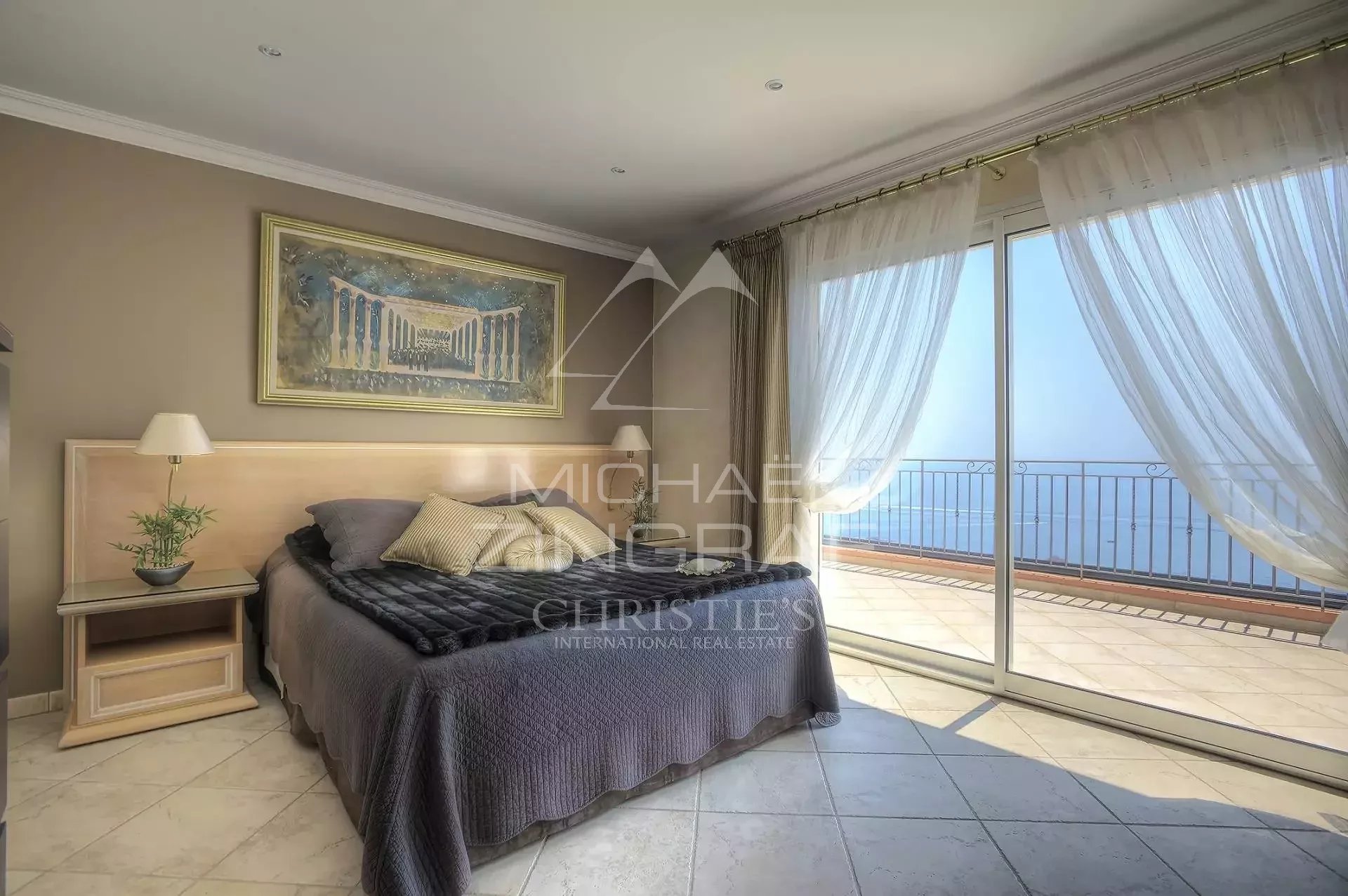 Room with Mediterranean view Room with sea view, open windows, elegant decor, natural light