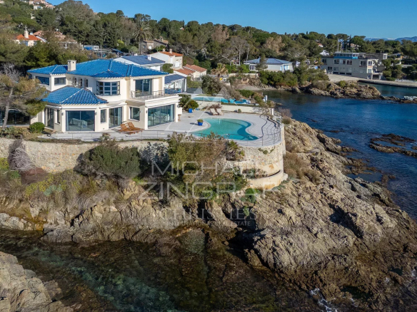 Waterfront property in Les Issambres with swimming pool and views of the Mediterranean Sea.