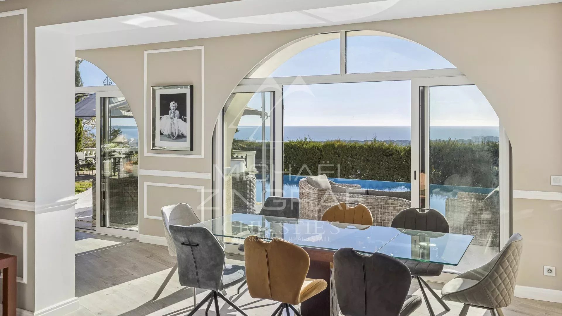 Villa with sea view in Mandelieu-la-Napoule Interior of a villa in Mandelieu-la-Napoule with sea view, modern dining room.