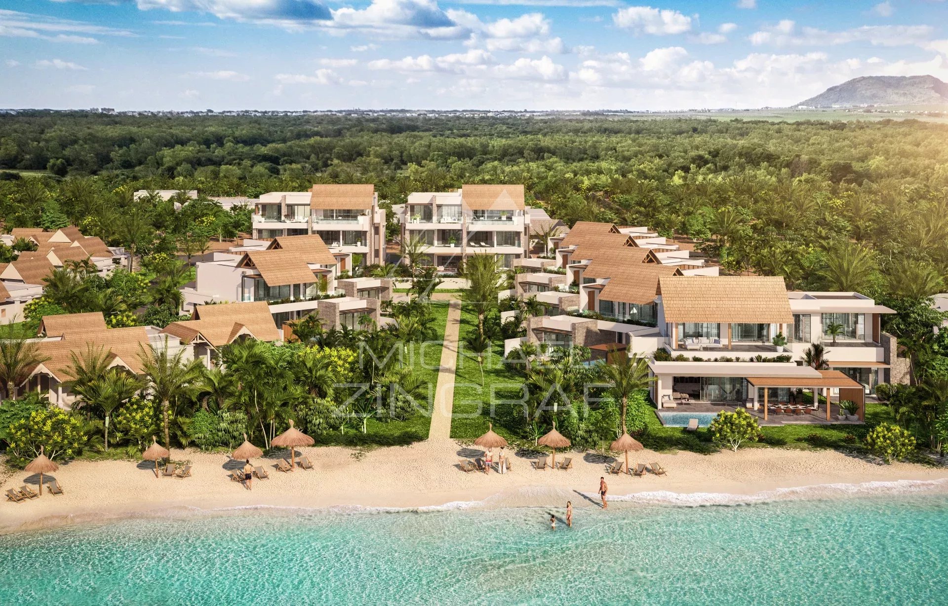 Luxurious beachfront resort with villa-style buildings among palm trees along a sandy shore and turquoise sea far from a forested hinterland, sunny sky.