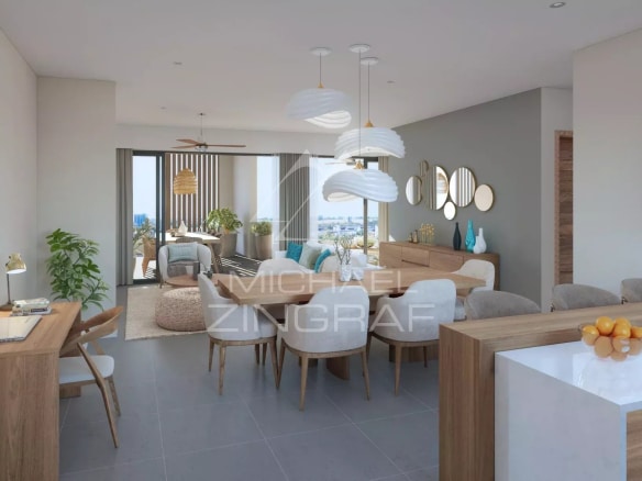 Intérieur d'un penthouse moderne avec salon, salle à manger et cuisine ouverte à Grand Baie.