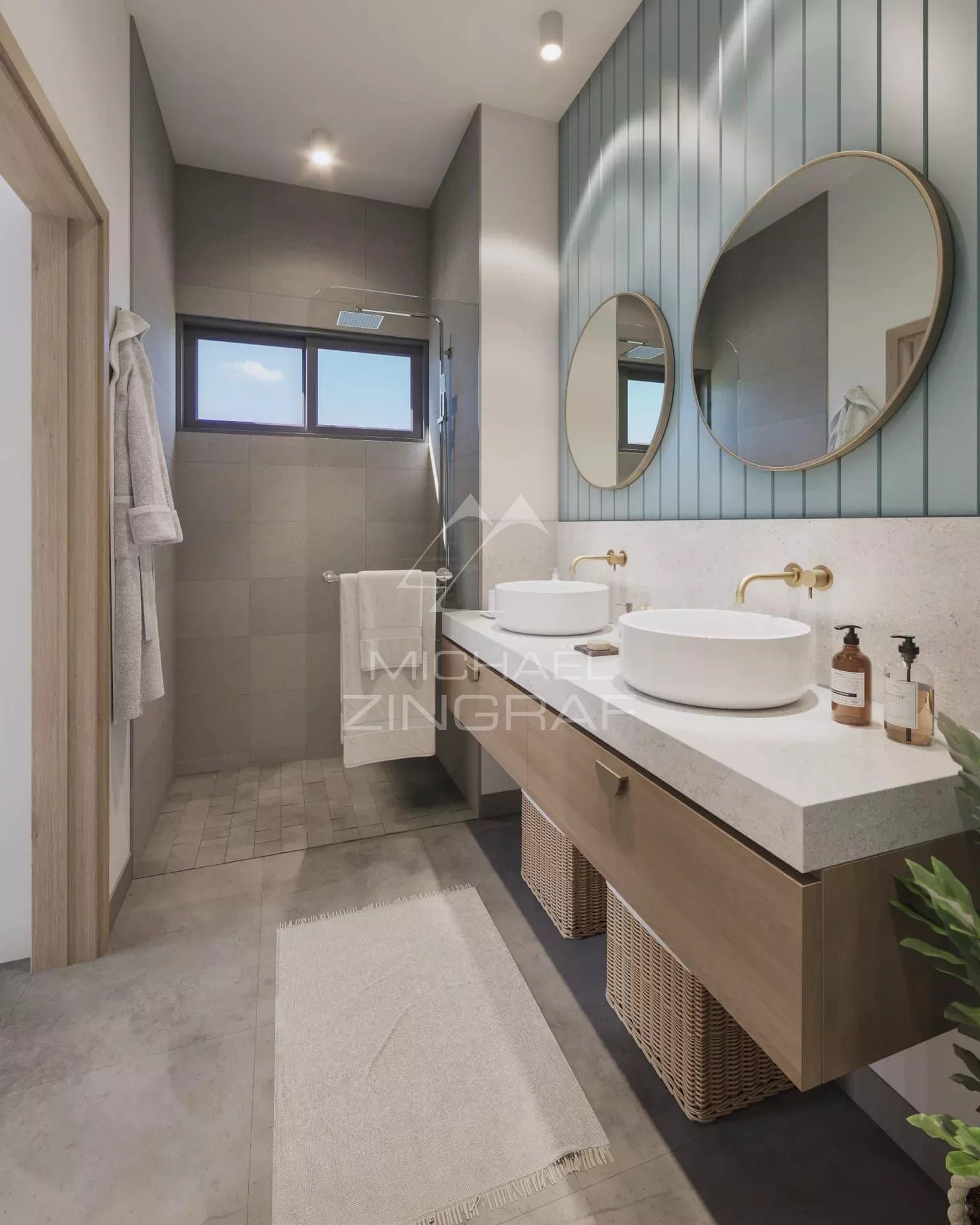 Salle de bains moderne avec deux lavabos et douche, décorée de carreaux gris et de miroirs ronds.
