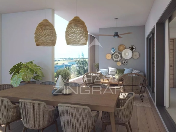 Terrasse d'un penthouse avec mobilier en rotin et décoration moderne à Grand Baie.