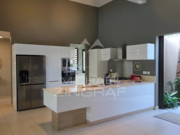 Interior of a contemporary villa with a modern kitchen in Pereybère