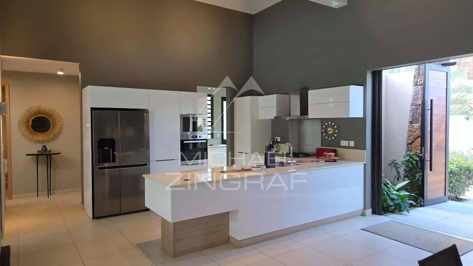 Interior of a contemporary villa with a modern kitchen in Pereybère