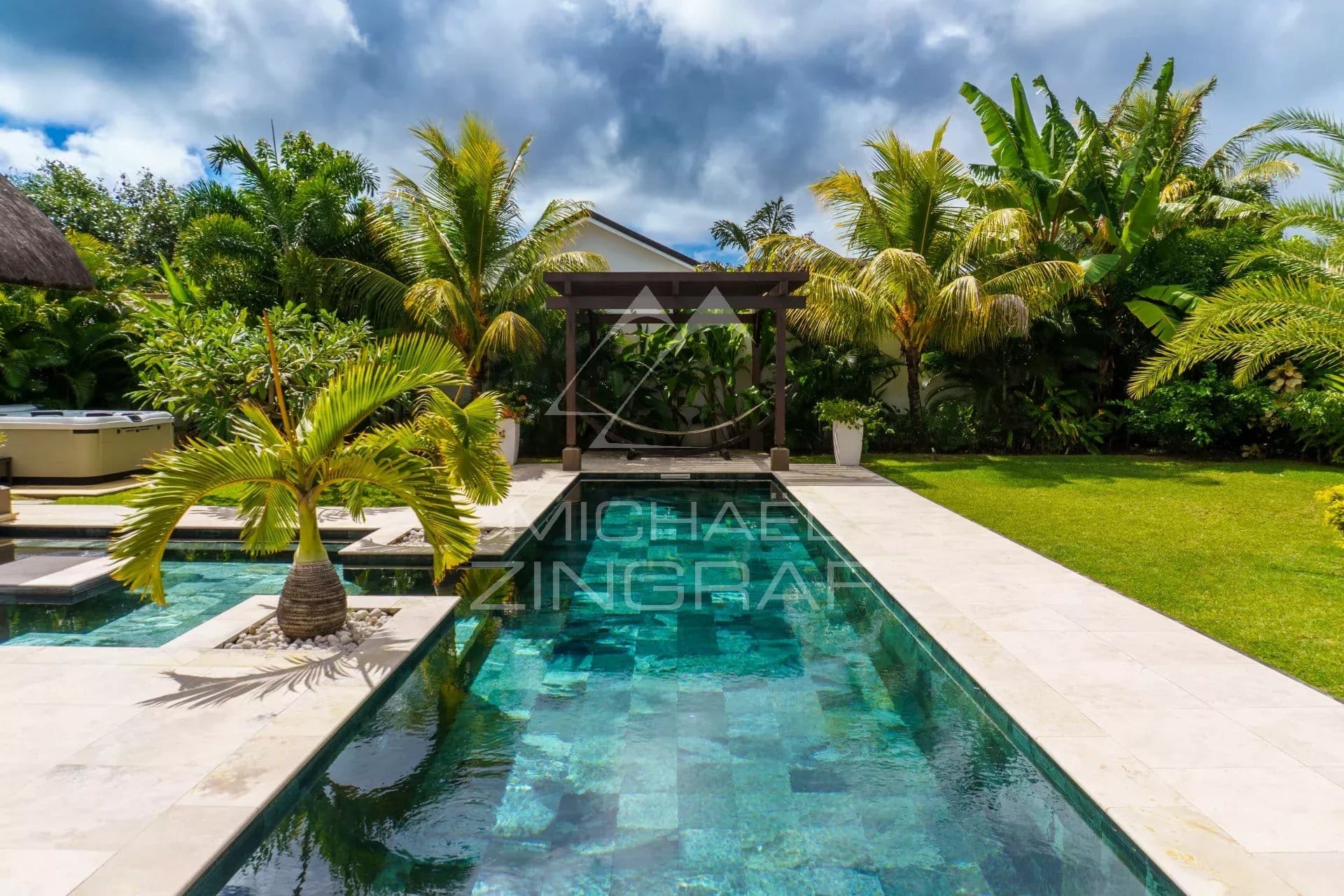 Villa with swimming pool surrounded by greenery in Grand Baie, Mauritius.