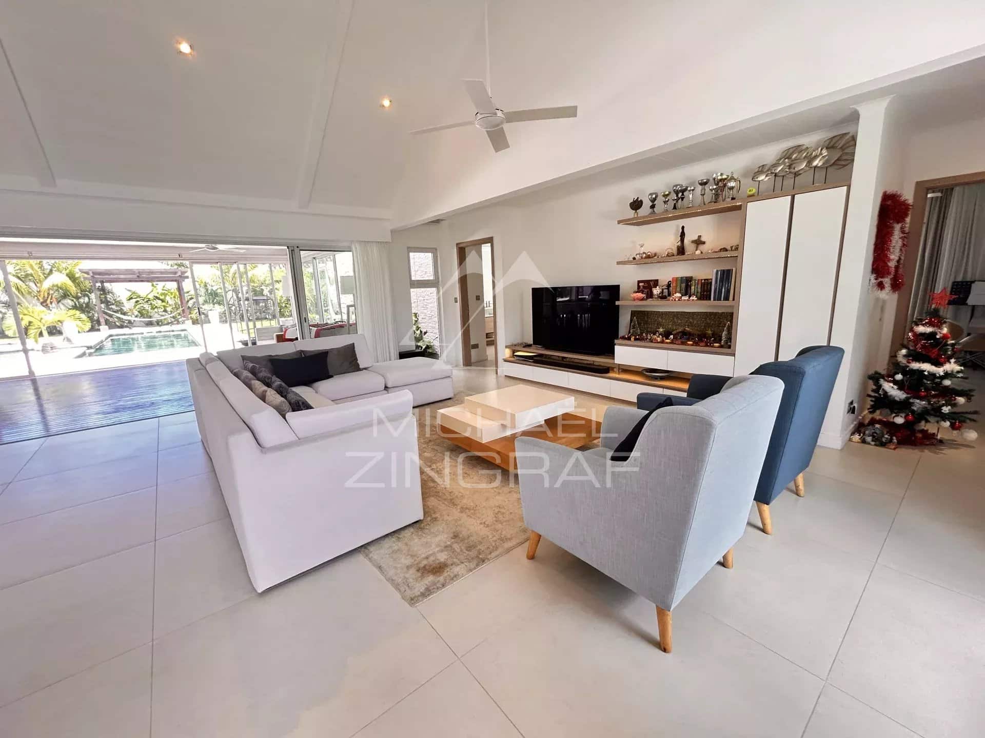 Modern interior of a villa in Grand Baie with spacious living room and contemporary decor.