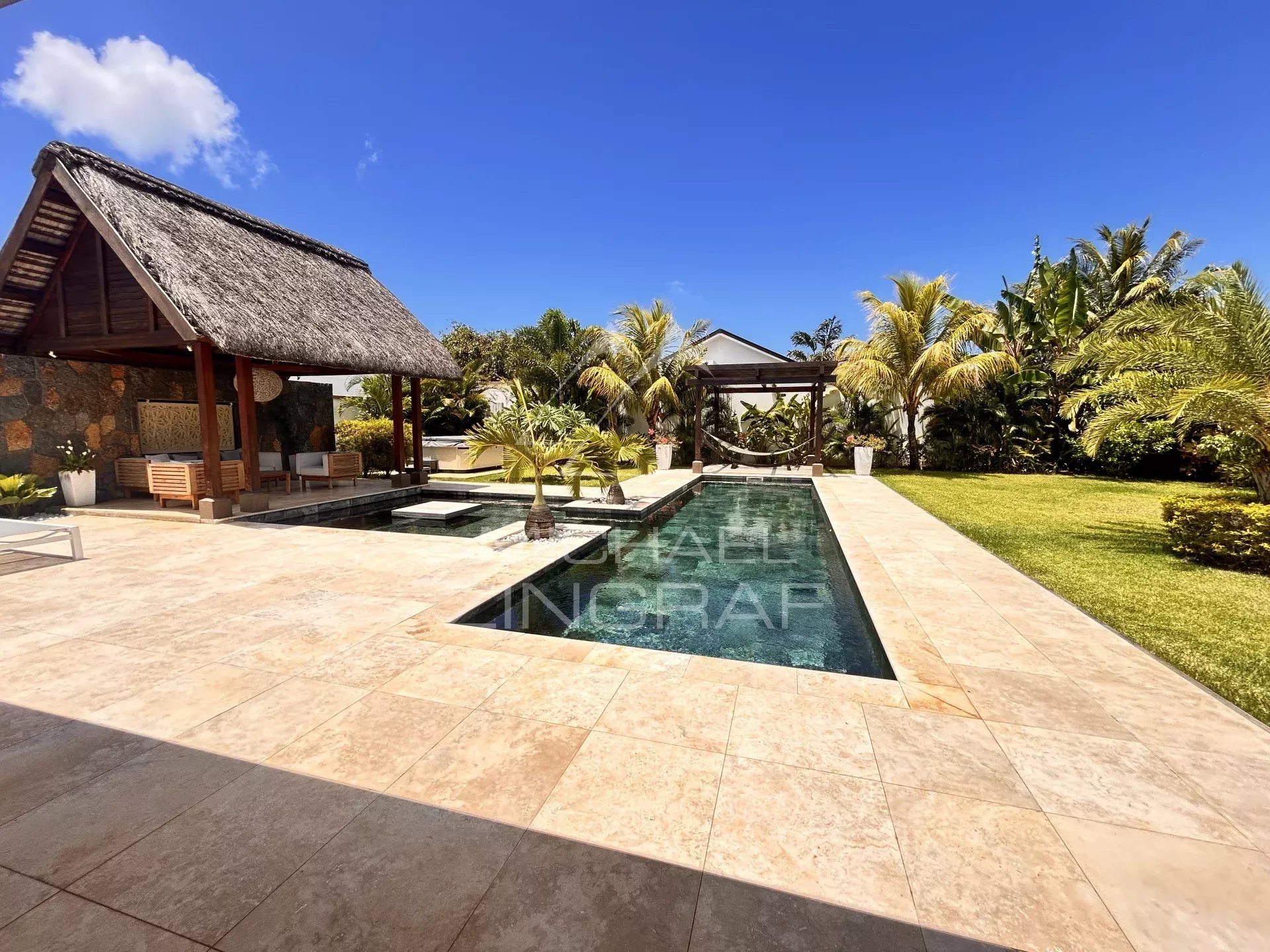 Villa with swimming pool and lush garden in Grand Baie, Mauritius.