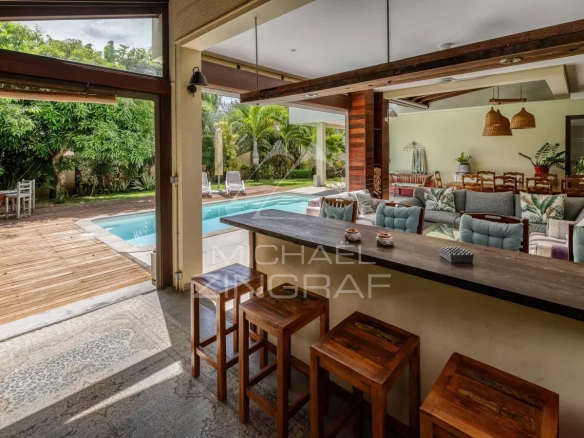 Interior of a villa with living room and bar overlooking the pool, Mont Mascal, Grand Baie.