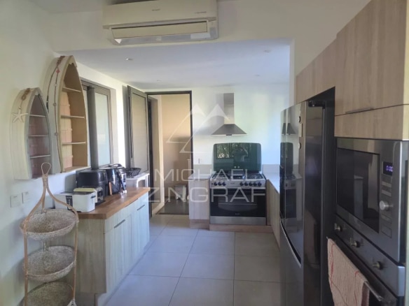 Modern kitchen in a villa in Mont Mascal, Grand Baie, with contemporary equipment.