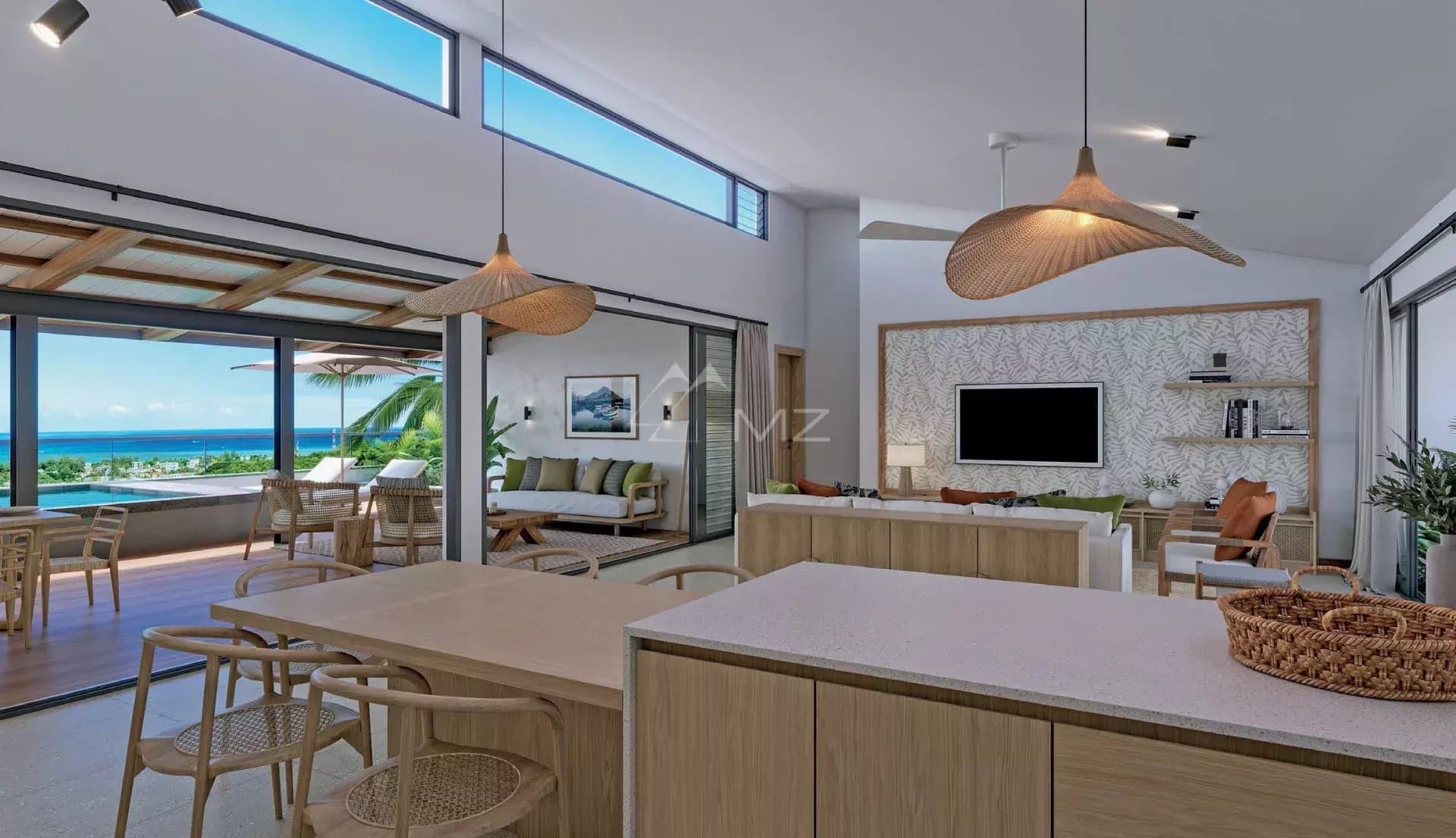 Intérieur d'une villa moderne avec vue sur l'océan à Rivière Noire, mobilier contemporain et grandes baies vitrées.