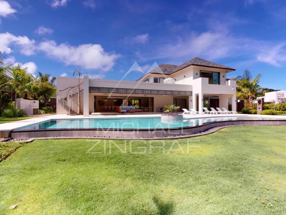 Modern villa with pool and garden on a golf course in Beau Champ, Mauritius.