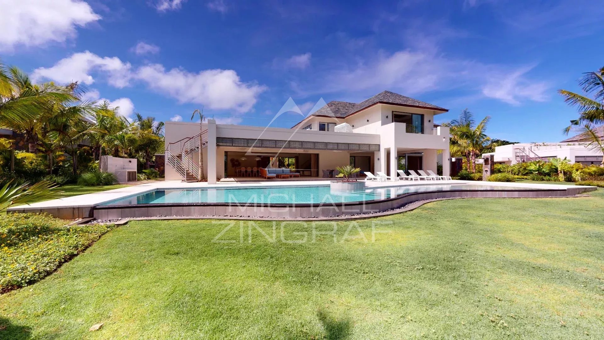 Modern villa on a golf resort Modern villa with pool and garden on a golf course in Beau Champ, Mauritius.