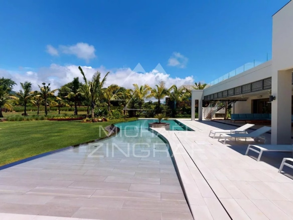 Modern villa with pool and garden on a golf course in Beau Champ, Mauritius.