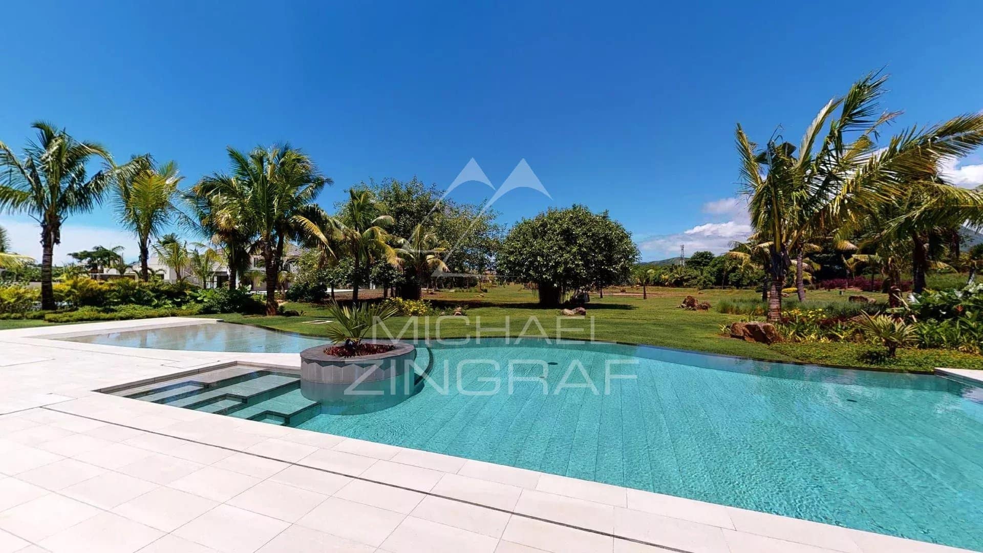 Modern villa in Beau Champ View of the pool and garden of a modern villa in Beau Champ, Mauritius.