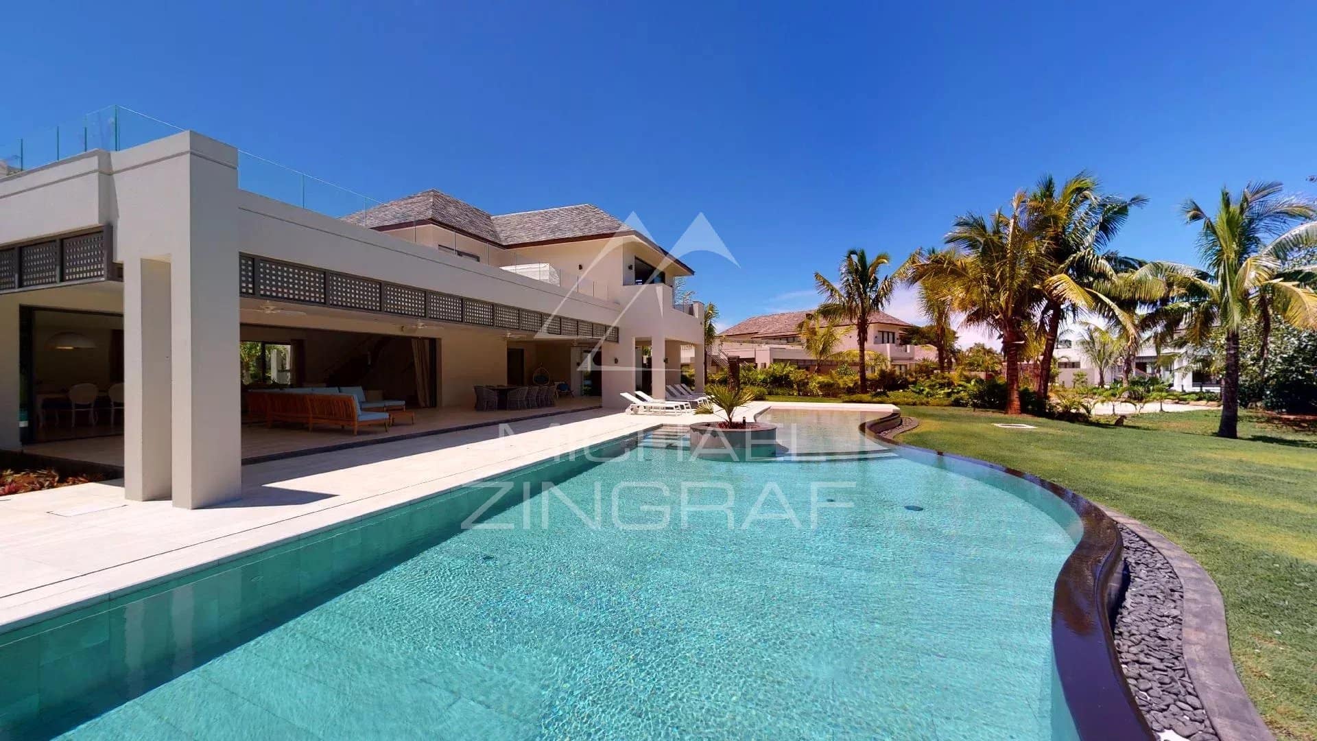 Modern villa on a golf resort Modern 4-bedroom villa with swimming pool on a golf course in Beau Champ, Mauritius.
