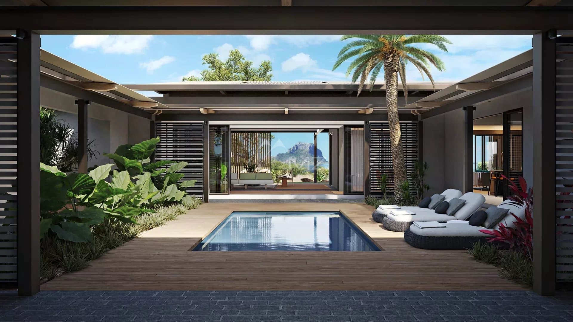 Villa moderne à Rivière Noire Vue intérieure d'une villa moderne avec piscine, entourée de verdure à Rivière Noire, Île Maurice.