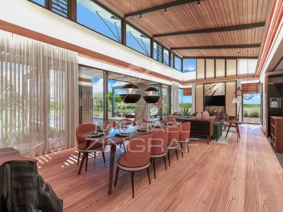 Intérieur d'une villa moderne avec salle à manger lumineuse et vue sur la nature.
