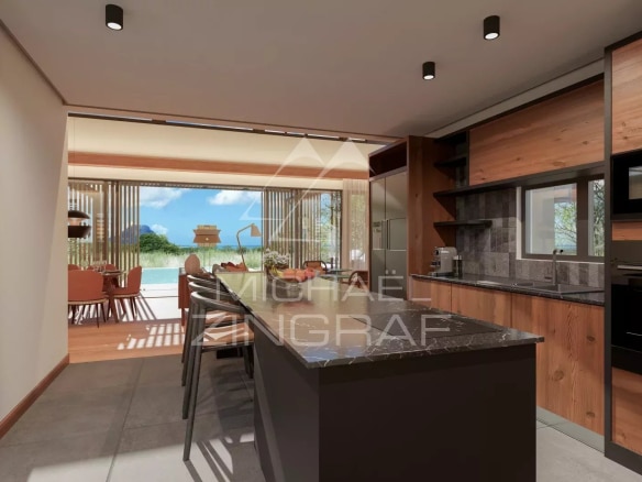Intérieur d'une villa moderne avec cuisine ouverte et vue sur l'extérieur à Rivière Noire, Île Maurice.