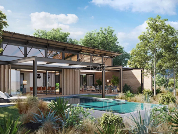 Villa moderne avec piscine et espace extérieur, entourée de verdure à Rivière Noire, Île Maurice.