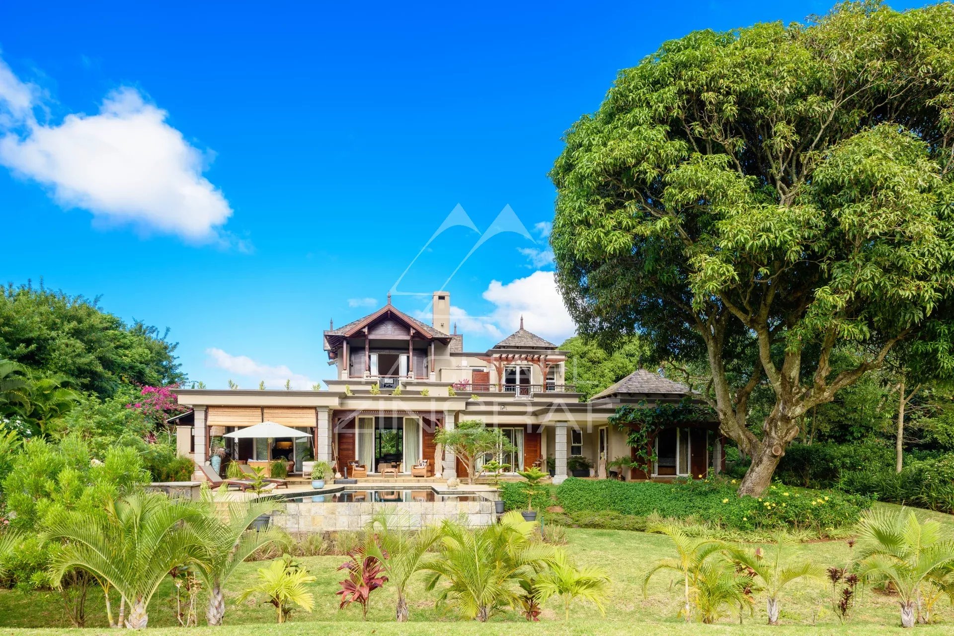 Spacious villa with pool and garden, located on a golf course in Bel Ombre, Mauritius.