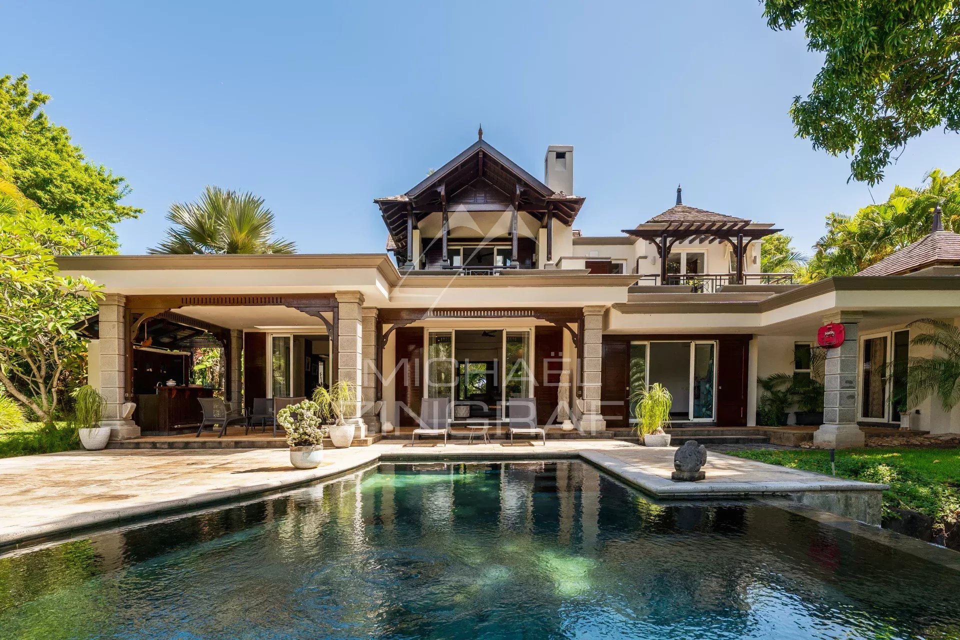 Spacious villa with swimming pool and garden, located in a golf estate in Bel Ombre, Mauritius.