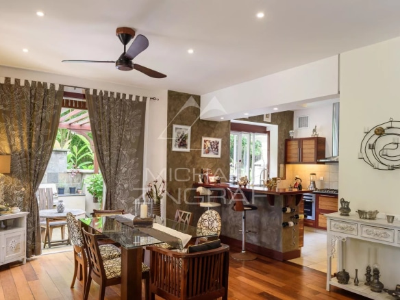 Interior of a villa in Bel Ombre, Mauritius, with modern living room and kitchen.