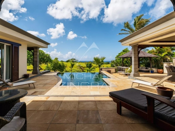 Villa in Bel Ombre with swimming pool and ocean view in a green setting.