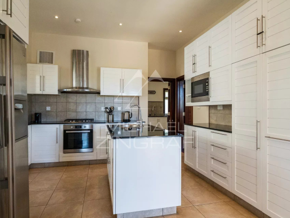 Modern and bright kitchen in a villa in Bel Ombre, Mauritius, with modern appliances.