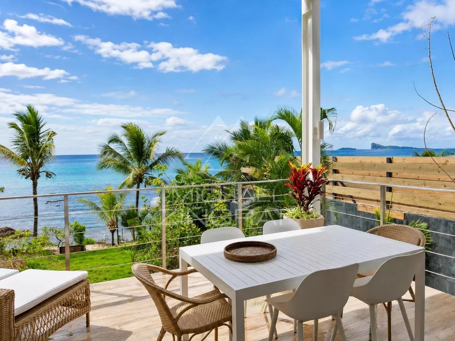 Apartment terrace with ocean and lagoon views in Pointe aux Canonniers, Grand Baie.