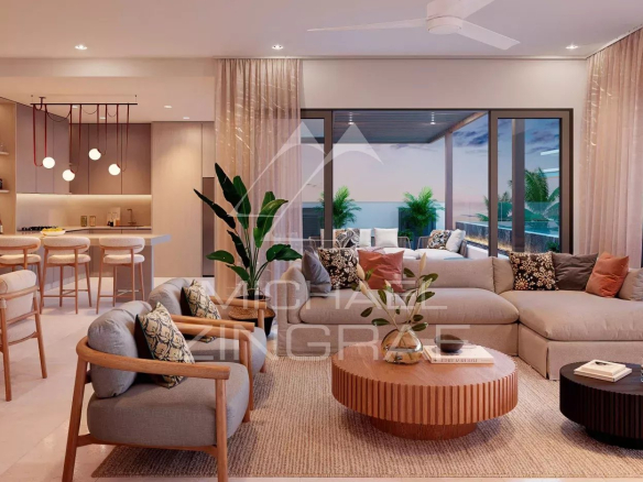 Intérieur d'un penthouse de luxe avec salon moderne et cuisine ouverte à Belle Mare.