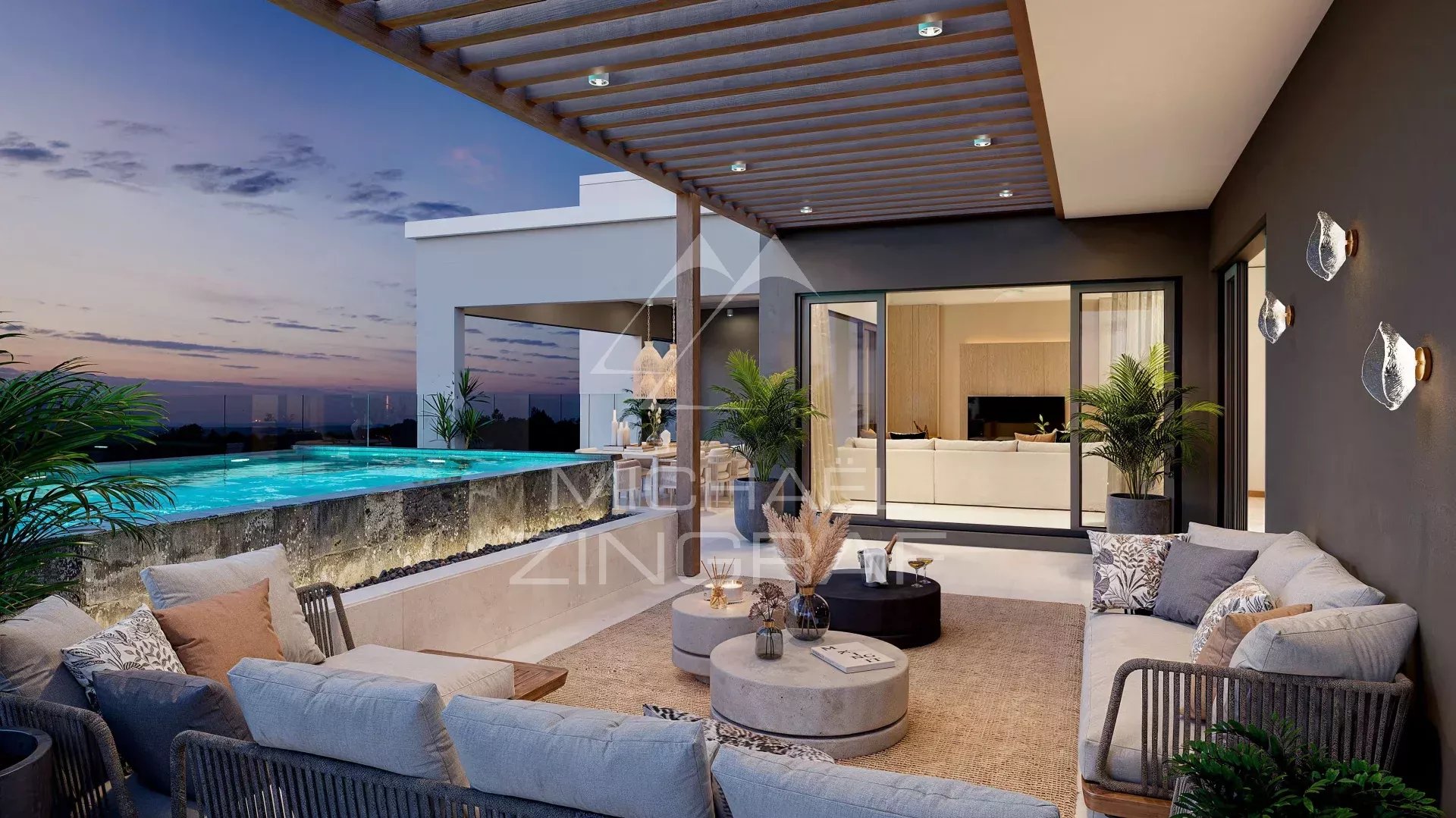 Penthouse de Luxe à Belle Mare Terrasse d'un penthouse de luxe à Belle Mare avec piscine et mobilier moderne.