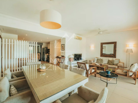 Interior of an elegant apartment with a large living and dining room, in Haute Rive.