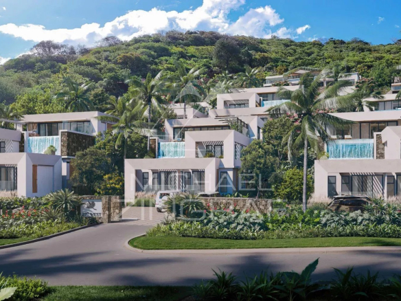 Vue d'ensemble d'une villa moderne de 3 chambres dans un domaine sécurisé à Rivière Noire, entourée de verdure.