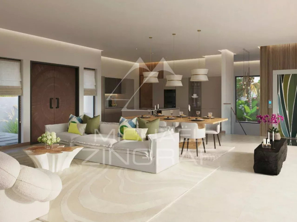 Intérieur moderne d'une villa avec salon et salle à manger, décoré avec des meubles contemporains.