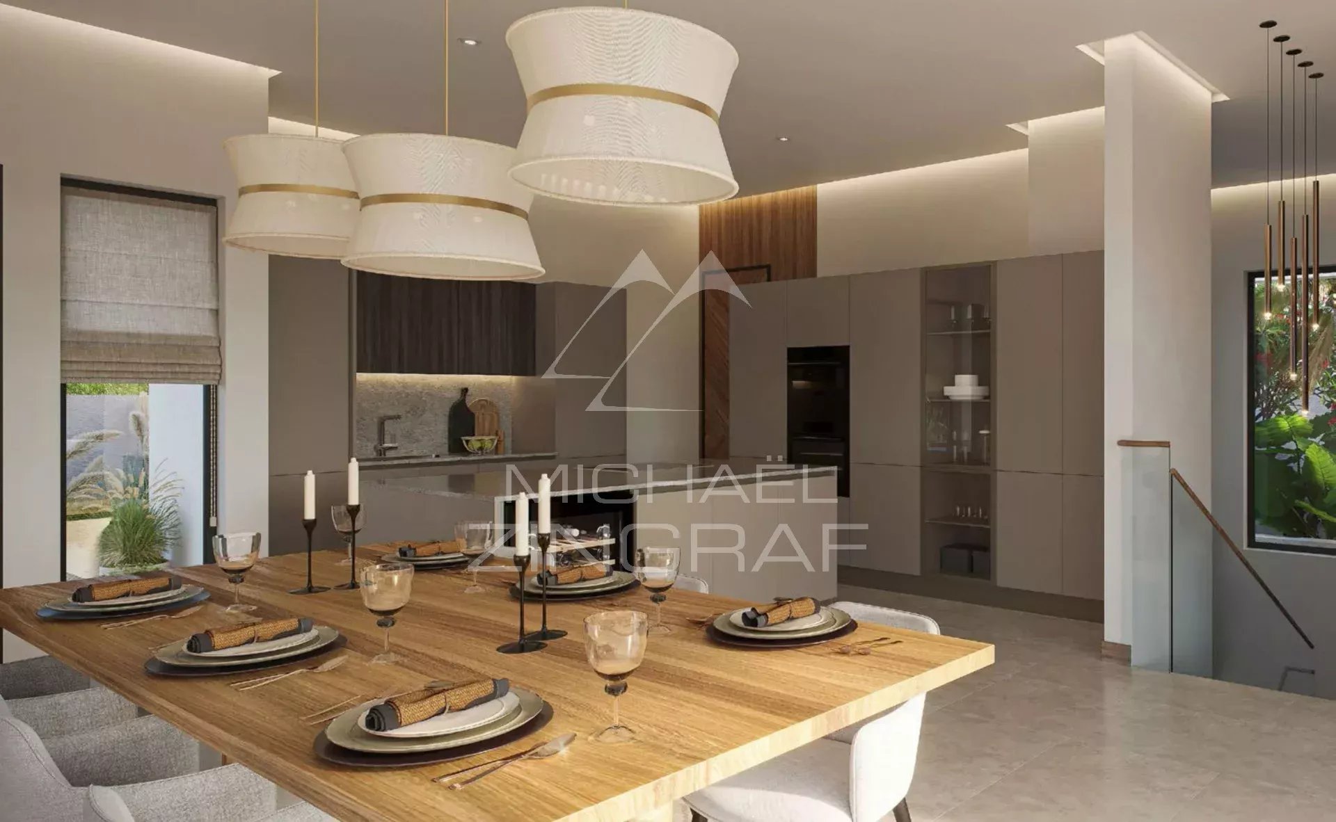 Intérieur d’une villa à Rivière Noire Intérieur d'une villa moderne avec une grande table à manger et des lampes suspendues.