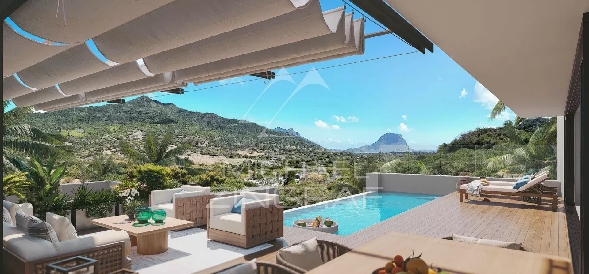 Villa d’exception à Rivière Noire Terrasse d'une villa avec piscine, vue sur montagnes et mer à Rivière Noire.