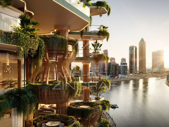 Vue d'un appartement moderne avec balcons végétalisés surplombant le Dubai Water Canal à Dubai.