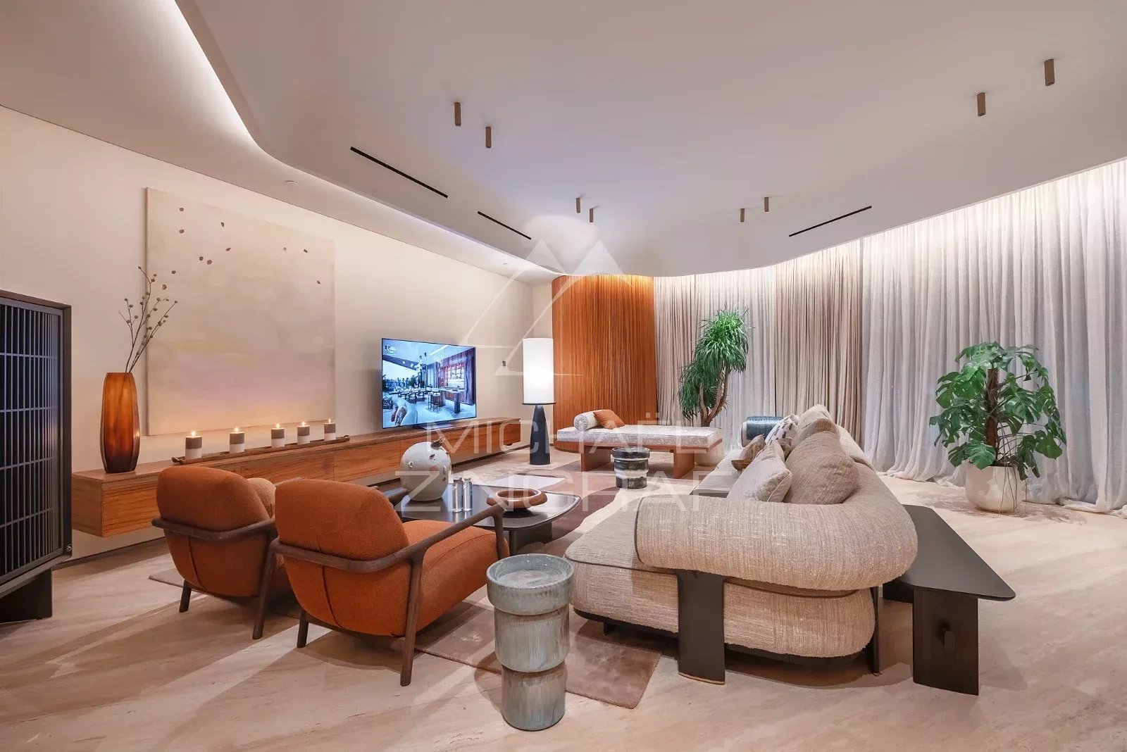 Salon d’un appartement à Dubai Intérieur d'un appartement luxueux à Dubai avec salon moderne et écran TV.