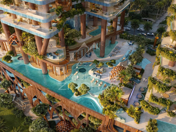 Aerial view of the EYWA building in Dubai, with swimming pool and green spaces.