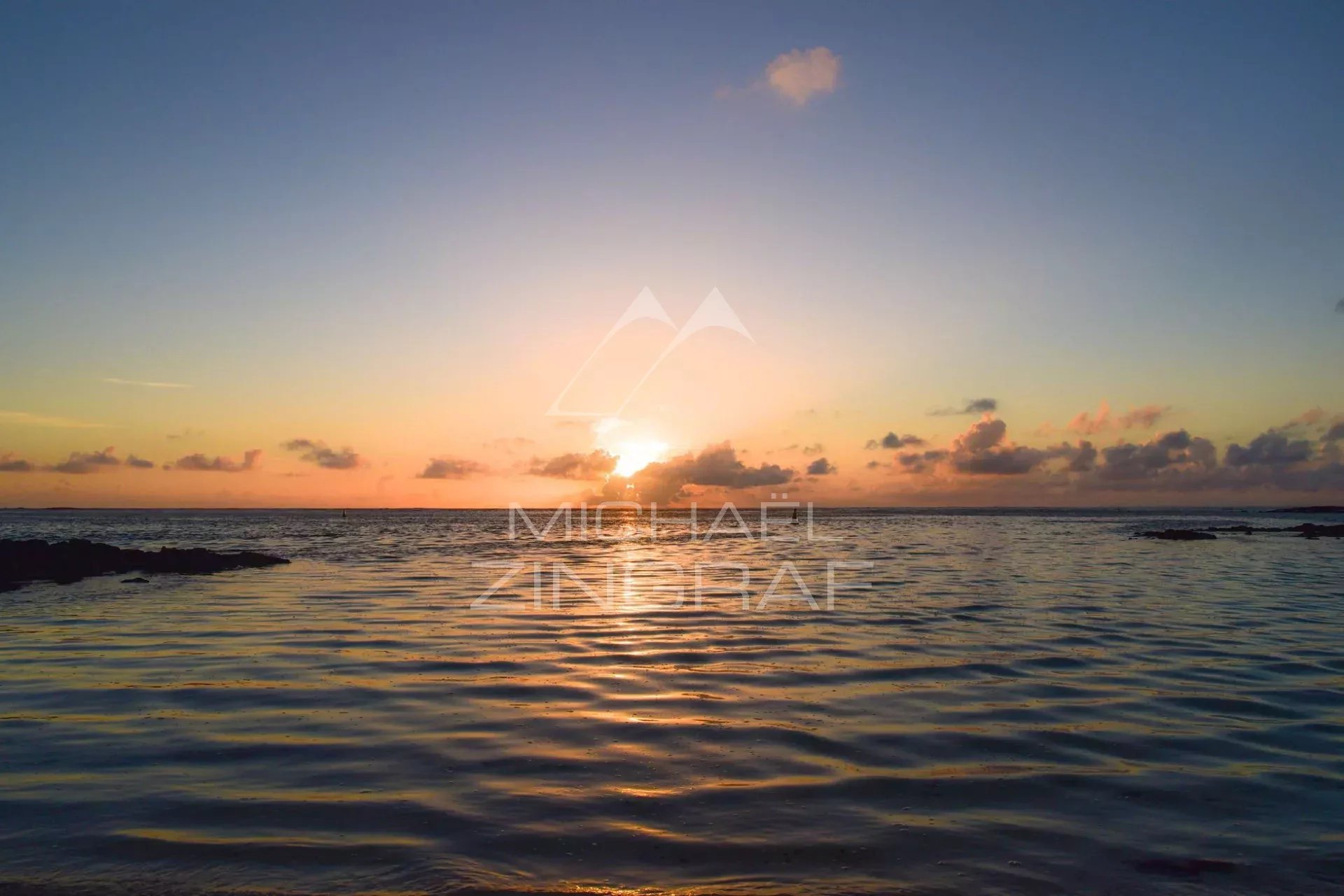 Sunset at Roches Noires Sunset over the Indian Ocean at Roches Noires, Mauritius.