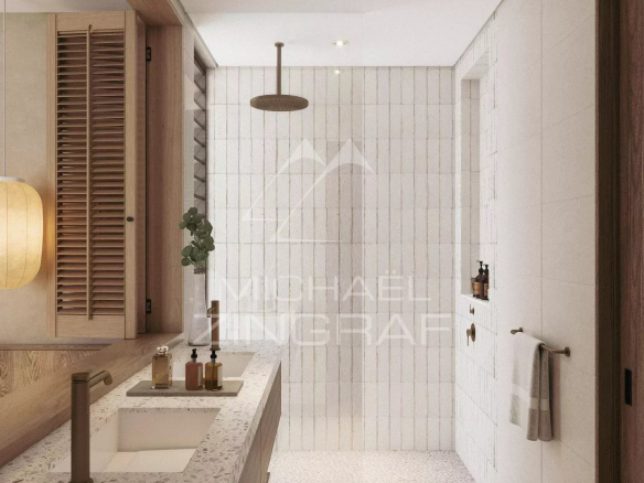 Modern bathroom with sink and shower in an apartment in Roches Noires.