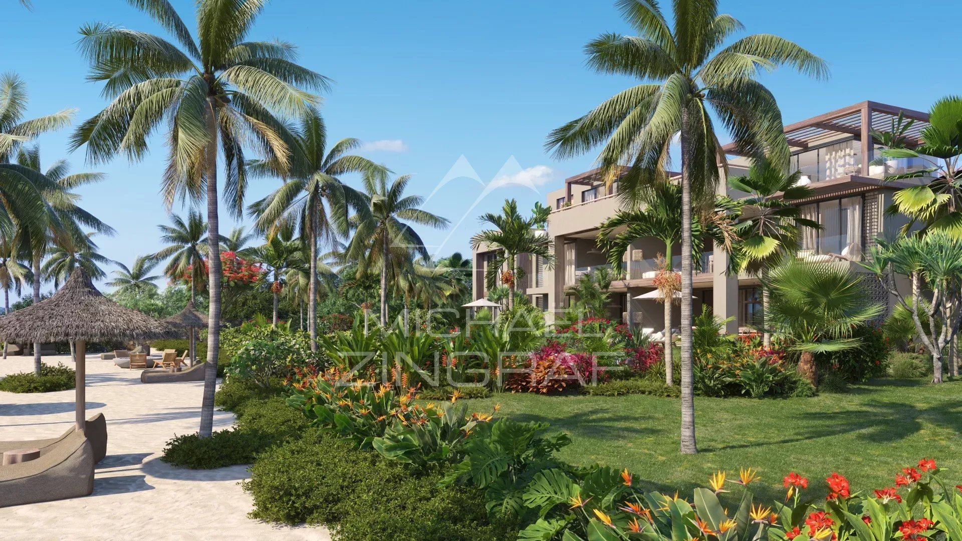View of a seaside apartment with palm trees and gardens in Roches Noires.